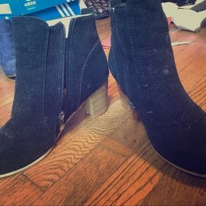 Black faux-suede booties with a 2.75 inch heel.
